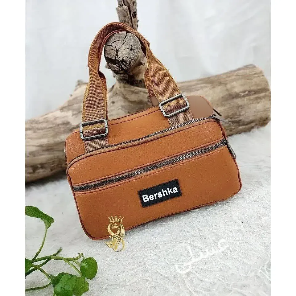 کیف دستی و دوشی چرم صنعتی زنانه مدل برشکا رنگ عسلی و مشکی
