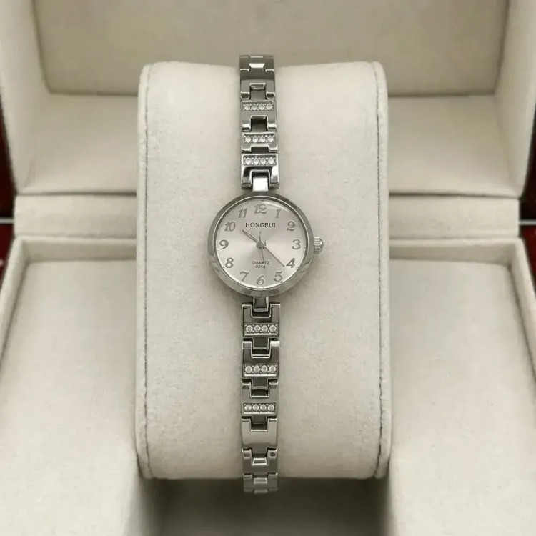 خرید ساعت مچی زنانه و دخترانه استیل صفحه گرد نگین دار بند استیل با جعبه کادویی