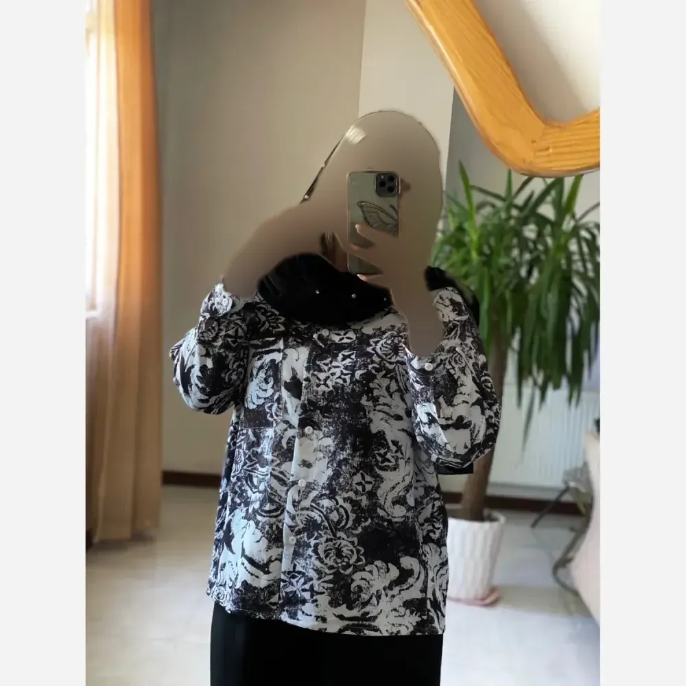 مانتو پتینه پریناز بوگاتی گرم بالا رنگ مشکی فری سایز