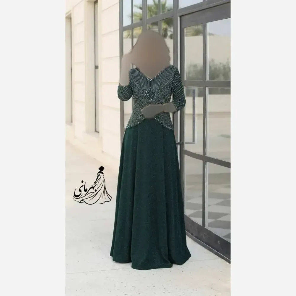 مانتو مجلسی زنانه روناک دیزاین شده با نگین و مروارید سایزبندی 42 تا 58 قد 150 جنس لمه