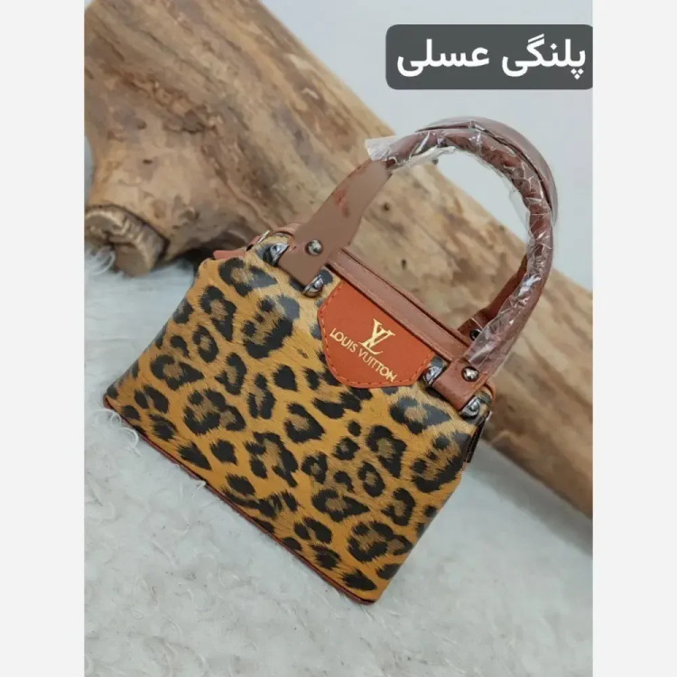 کیف مجلسی چرم صنعتی مدل صدف رنگی