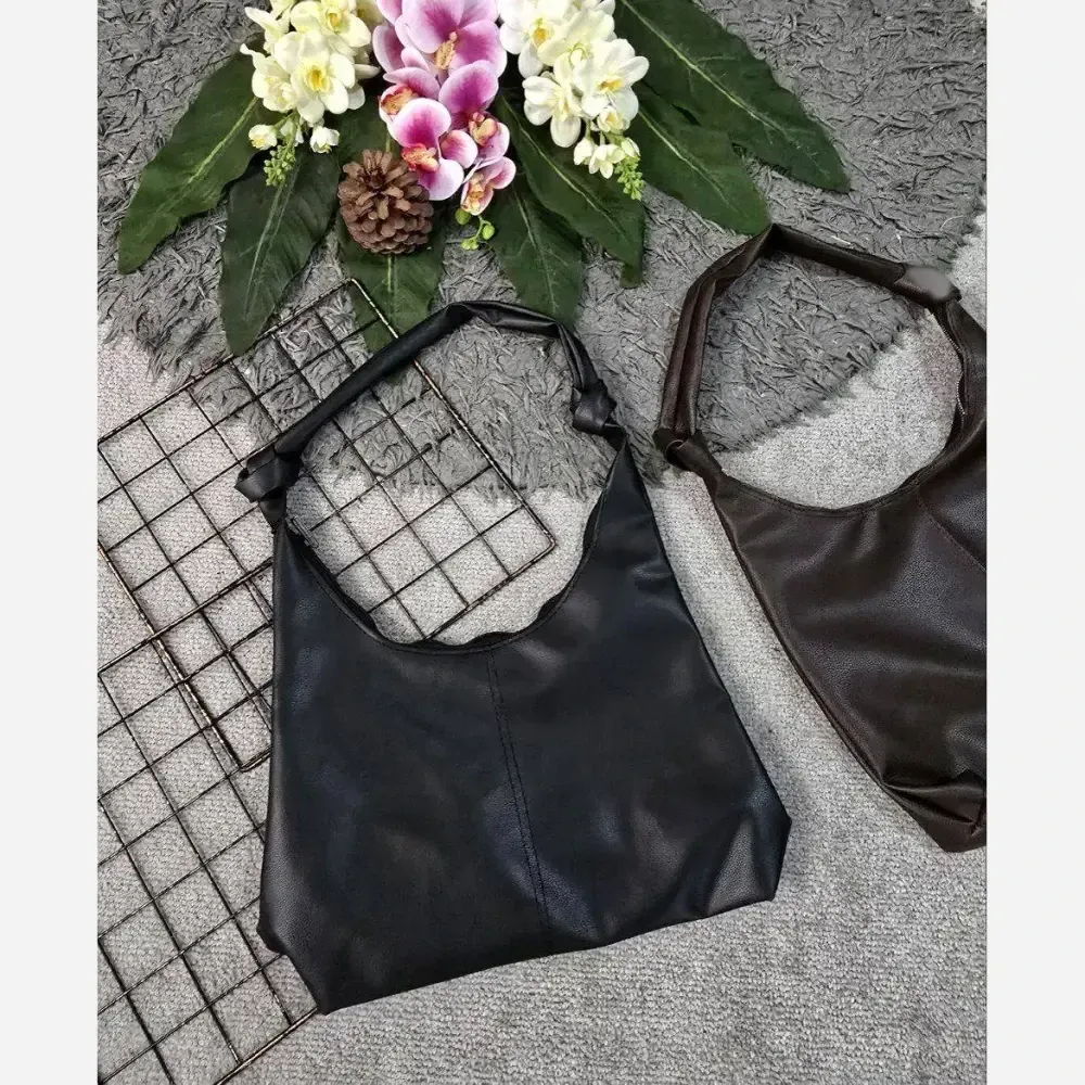 کیف بند گره ای چرمی زنانه سبک و جادار رنگ مشکی و موکا