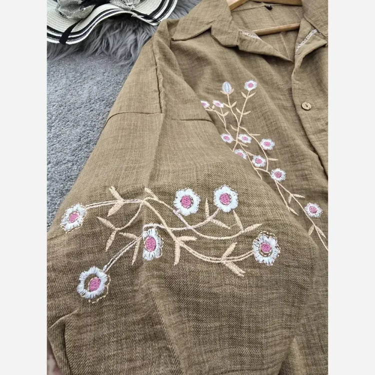 شومیز مانتویی آرتینا گلدوزی شده جنس شانتون در رنگ بندی کرم، نسکافه ای، سبز سدری، سرمه ای، قهوه ای و سایز یک و دو